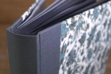 Square photo album with many pages to stick photos
